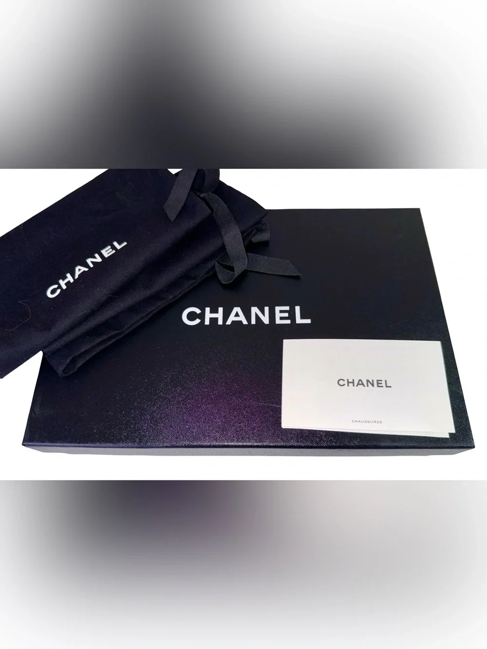 CHANEL BLACK CAMELLIA THONG JELLY SANDALS